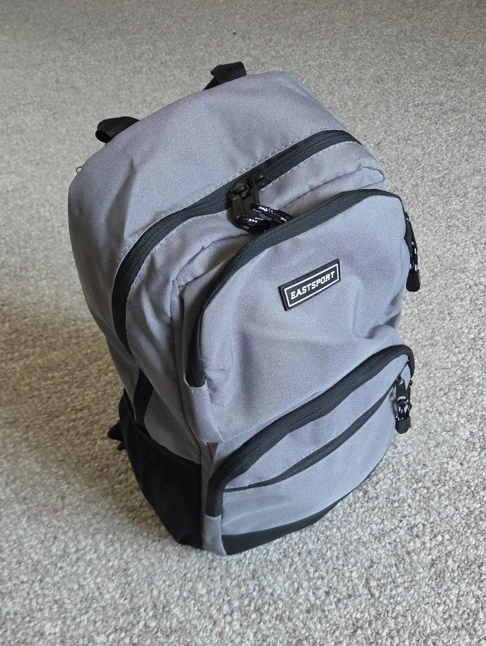 NWOT Eastsport Gray Backpack with Multiple Pockets